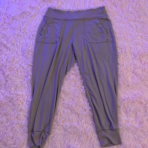 Cream colored joggers. Super stretchy. Has pockets. No adjustable strings.